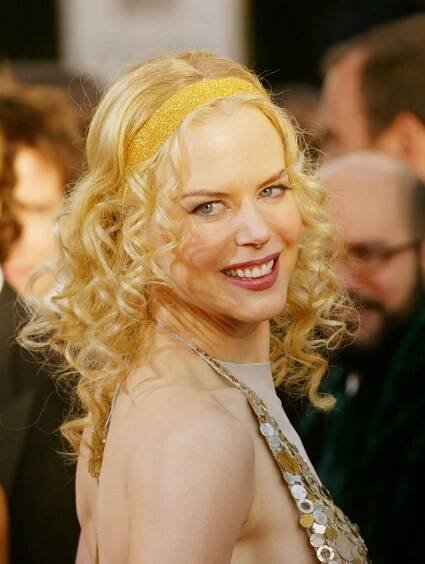 Nicole Kidman Smiling Looking to Side Curls and Gold Headband at 2004 Golden Globe Awards 