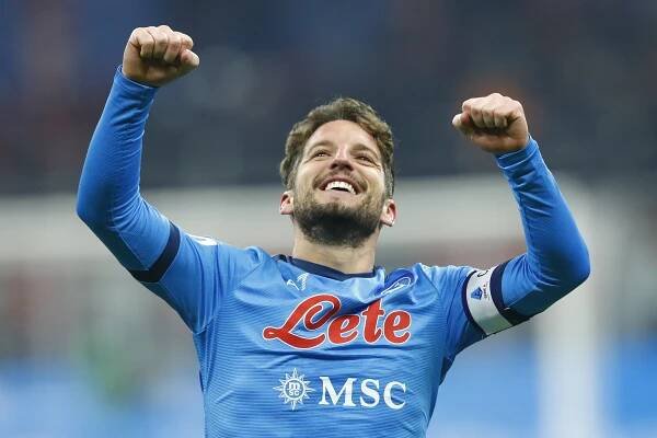 Dries Mertens celebrates after scoring for Napoli against AC Milan in December 2021.