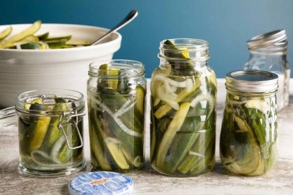 Canning Pickle wedges in mason jars