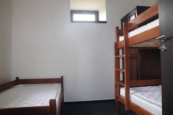 Postel nebo postele na pokoji v ubytování apartmány Kynast