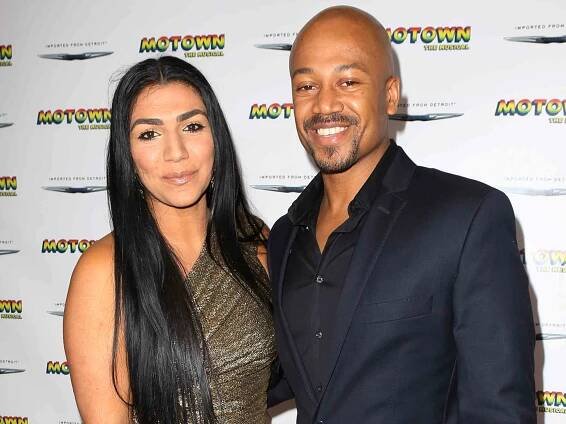 Asa Soltan Rahmati and Jermaine Jackson Jr. attending the Motown Family Night on Broadway in 2013.
