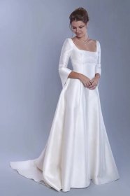 Luxusní smetanové svatební šaty s delšími rukávy