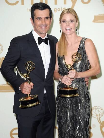 Julie Bowen and her Modern Family husband, Ty Burrell, with their Emmys in 2011