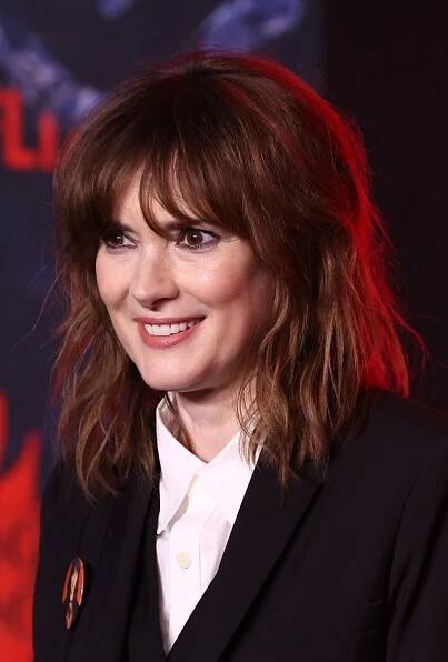 Winona Ryder with tousled shag haircut with bangs