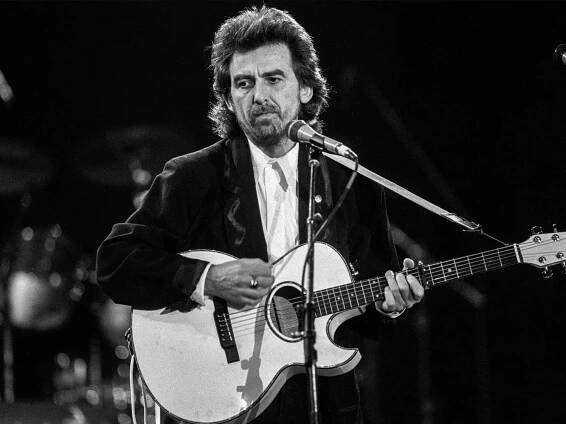 George Harrison performing live