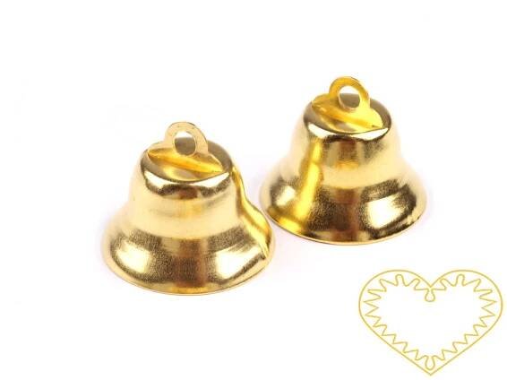 Zlaté kovové zvonečky 12 x 20 mm - sada 50 ks. Zvonečky mají srdce z plíšku, takže skutečně zvoní. Vhodné pro tvorbu dekorací a vánočních aranžmá.
