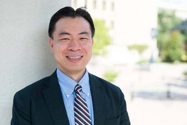 Tony Yang outside in Foggy Bottom Campus