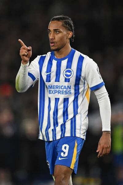 Joao Pedro of Brighton & Hove Albion gesturing during a soccer match.