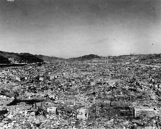 an old black and white photo of a large amount of rubble in the middle of nowhere