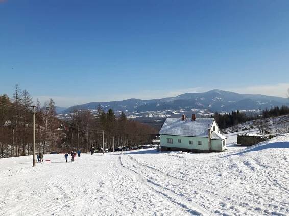 Opálená - pohled od sjezdovky k Lysé hoře