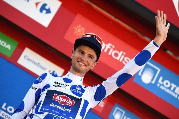 MONTILLA SPAIN  SEPTEMBER 02 Jay Vine of Australia and Team AlpecinDeceuninck  Polka Dot Mountain Jersey celebrates at podium during the 77th Tour of Spain 2022 Stage 13 a 1684km stage from Ronda to Montilla 315m  LaVuelta22  WorldTour  on September 02 2022 in Montilla Spain Photo by Tim de WaeleGetty Images