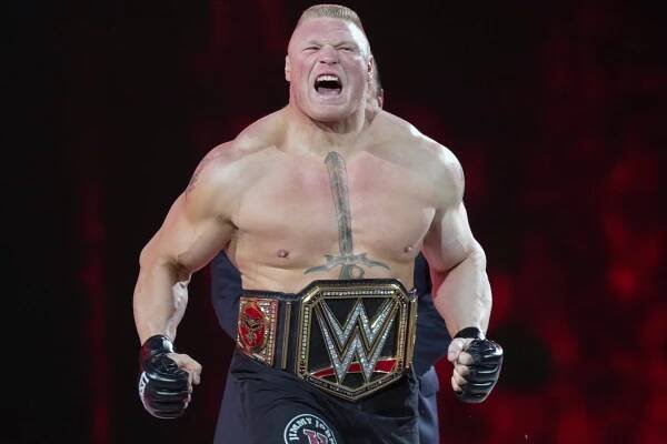 Brock Lesnar with the WWE champions belt