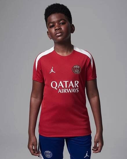 Paris Saint-Germain Strike Fourth Big Kids' Jordan Dri-FIT Soccer Knit Short-Sleeve Top - Wings Jordan Red/Wings Jordan Red/Phantom/Phantom
