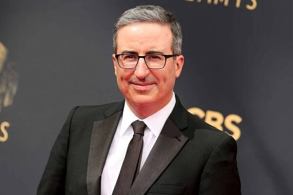 Watch John Oliver meet his TikTok impressionist