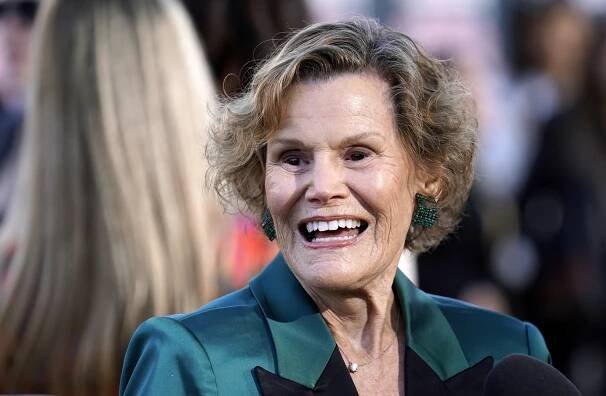Judy Blume smiles at a movie premiere event.