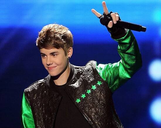 Justin Bieber performing at The X Factor Live Finale.
