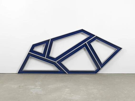 An image containing a sculpture by Richard Deacon of powder coated stainless steel