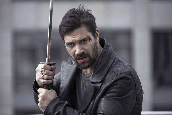 Beta Test Trailer: Manu Bennett Plays a Man Controlled By a Video Game