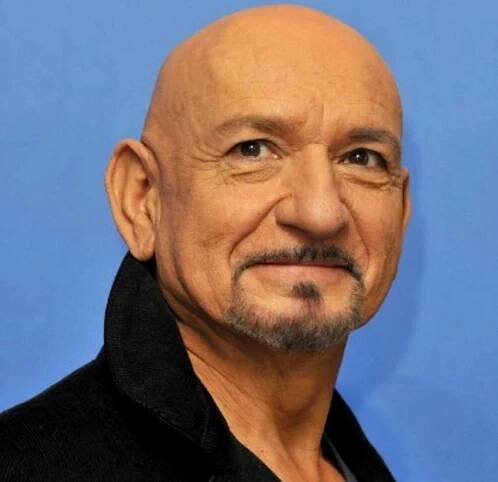 Caption: Ben Kingsley Flashing a Warm Smile in a Portrait Shot Wallpaper