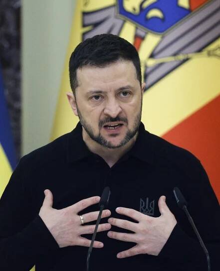 Volodymyr Zelensky speaking at a press conference.