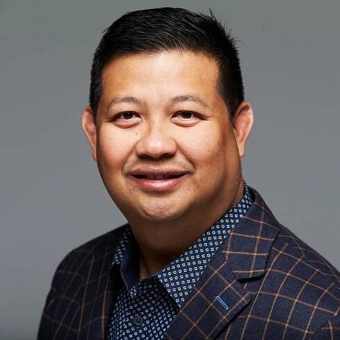 Portrait of Izzy Carunungan, the new Senior Vice President of Marketing and Client Success at LCP360.