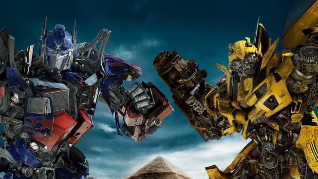 Epic Scene in 4K Ultra HD featuring Transformers heroes Optimus Prime and Bumblebee Wallpaper