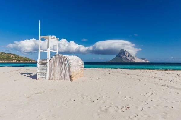 Amazing beach and countryside in Porto Cervo in partly cloudy weather