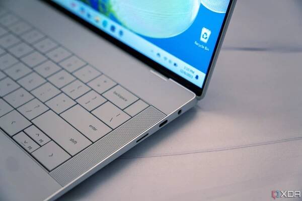 A close up of a Platinum Dell XPS 14 seen at an angle.