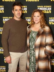 Chris Fischer and Amy Schumer pose at the re-opening night of David Byrne's "American Utopia" on Broadway at The St. James Theatre on October 17, 2021 in New York City