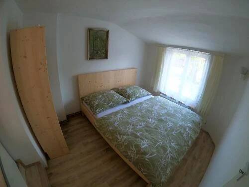 Postel nebo postele na pokoji v ubytování Chalupa pod Zámkem
