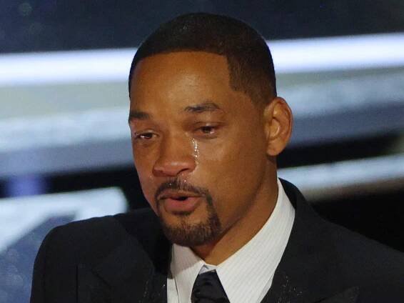 Will Smith cries as he accepts the Oscar for Best Actor in "King Richard" at the 94th Academy Awards in Hollywood, Los Angeles, California, U.S., March 27, 2022.