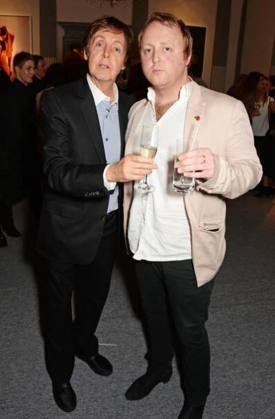 Paul and James McCartney attend the book launch and private view of "Mary McCartney: Monochrome And Colour" in 2014