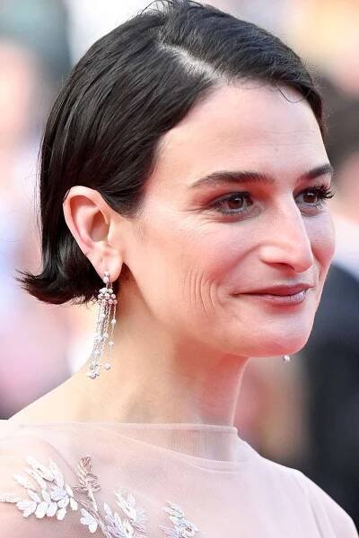 Jenny Slate attends the "The History Of Sound" red carpet at the 78th annual Cannes Film Festival at Palais des Festivals on May 21, 2025 in Cannes, France