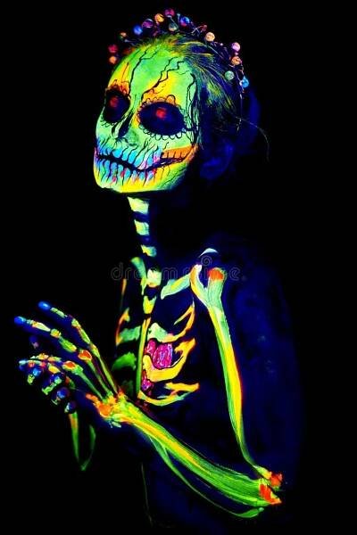 UV body art painting of helloween female skeleton