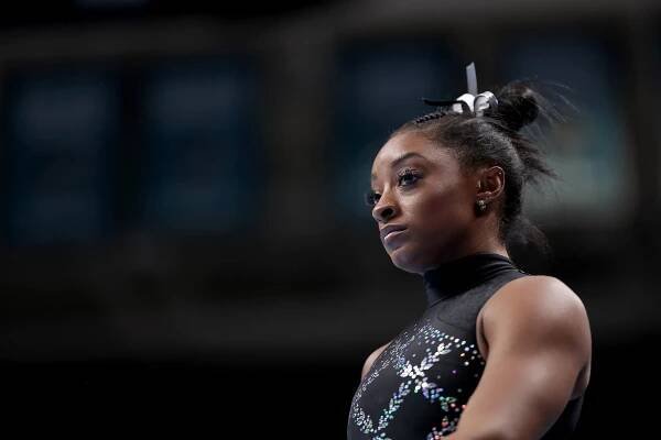 Simone Biles says it ‘broke my heart’ to see footage of a Black girl ignored in gymnastics ceremony