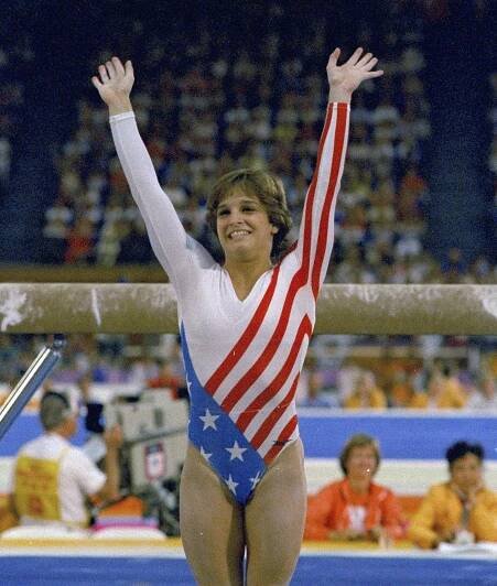 Mary Lou Retton reacts to applause after her performance at the Summer Olympics in Los Angeles on Aug. 3, 1984. 