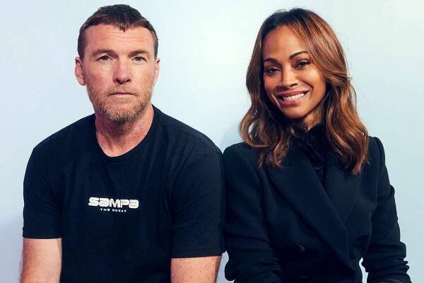 Sam Worthington and Zoe Saldana of Avatar 3 pose in the IMDb Official Portrait Studio at D23 2024 at Honda Center on August 09, 2024 in Anaheim, California. 