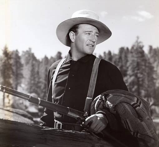 A black-and-white photo of John Wayne in Shepherd of the Hills.