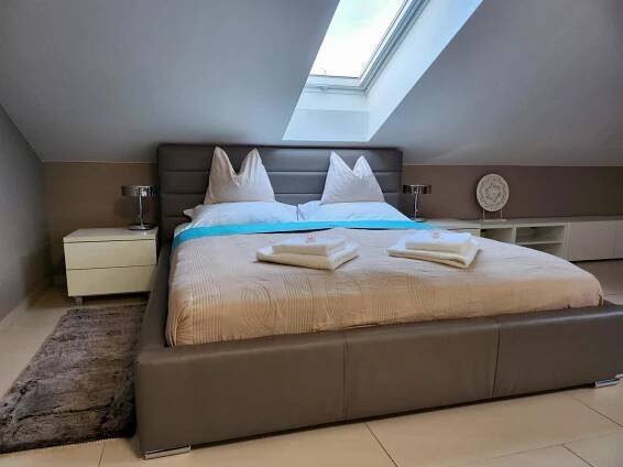 Posteľ alebo postele v izbe v ubytovaní Wellness Apartmány EMPORIO
