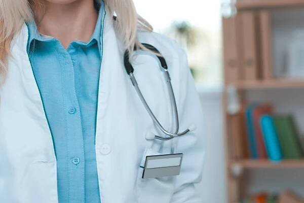 Young woman doctor occupation in the hospital office