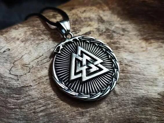 Valknut surrounded by Jörmungandr made of stainless steel