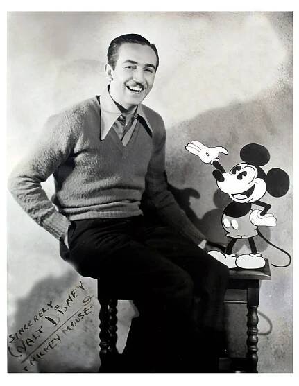 Walt Disney with Mickey Mouse in 1929