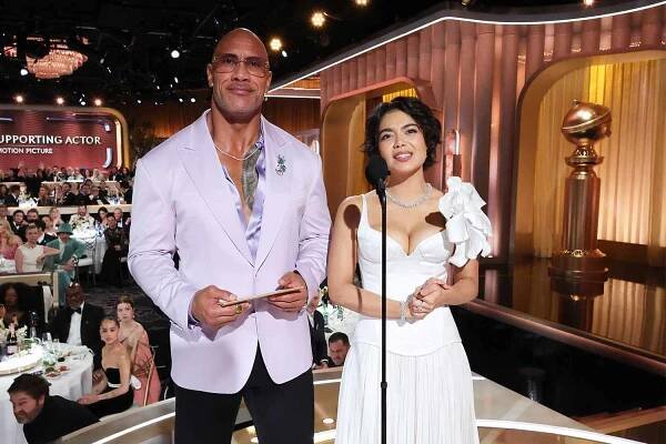 Dwayne Johnson, Auli'i Cravalho during the 82nd Annual Golden Globes held at The Beverly Hilton on January 05, 2025 in Beverly Hills, California. 