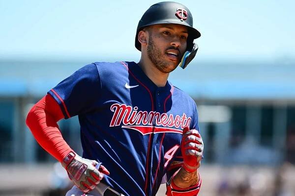 Carlos Correa #4 of the Minnesota Twins runs the bases after hitting a home run in the fourth inning against the Tampa Bay Rays during a Grapefruit League spring training game at Charlotte Sports Park on March 29, 2022 in Port Charlotte, Florida.