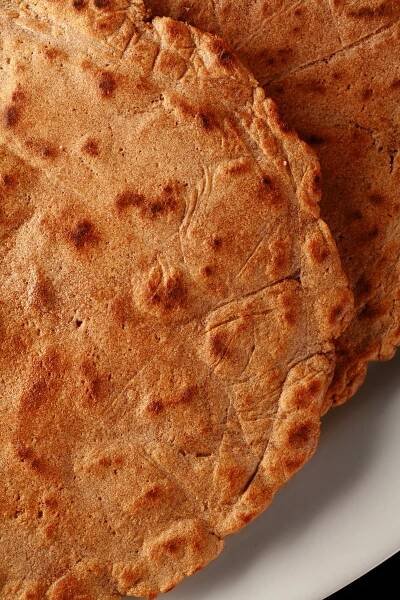 4 cassava flour paleo / AIP pitas on a white plate.