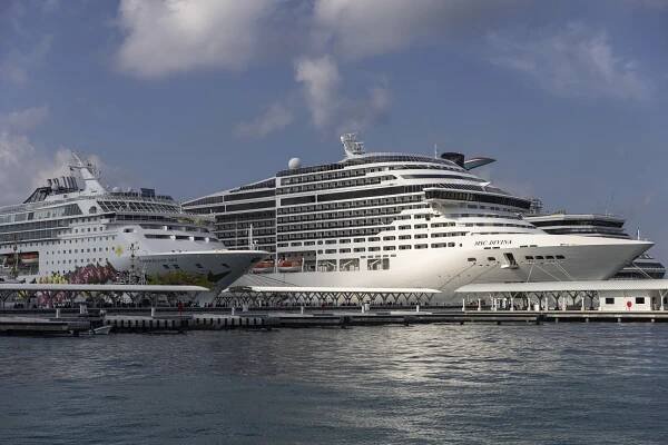 Cruise ships docked at a port in Nassau, Bahamas.