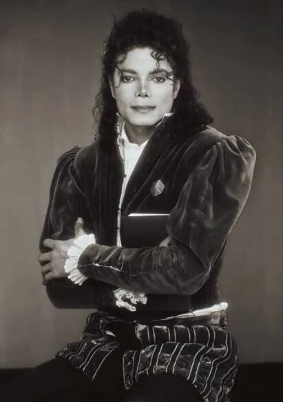 michael jackson is shown in this black and white photo
