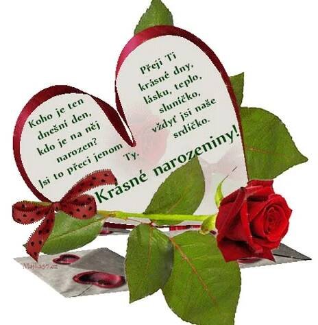 a red rose sitting next to two heart shaped cards with words written on them and a green background