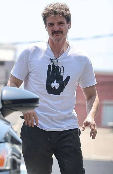 Pedro Pascal is spotted dumping nearly a full cup of coffee out as he steps out of the gym in Los Angeles