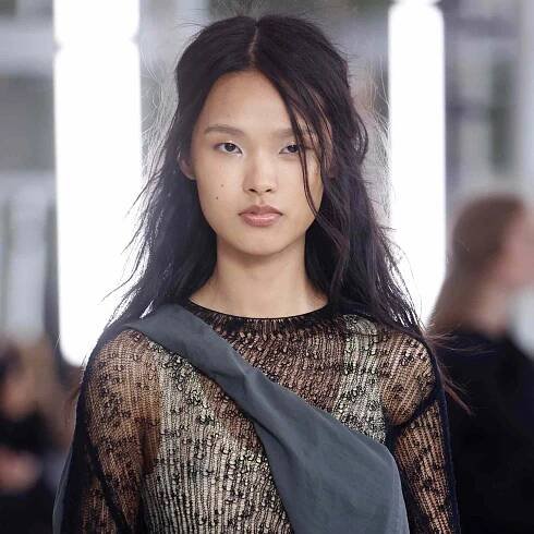 Issey Miyake middle part wispy layers 